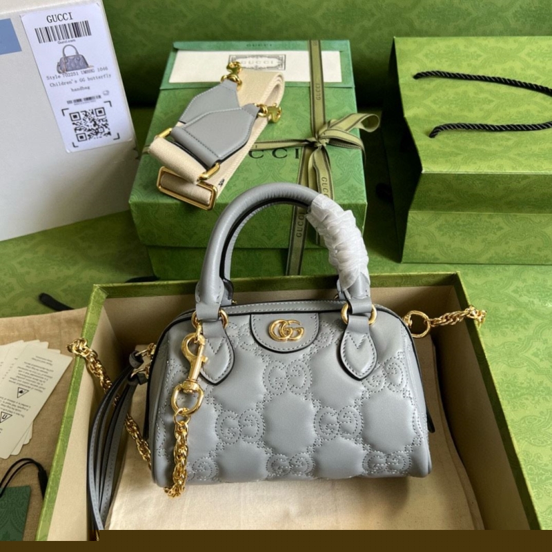 G*u*i top handle bags